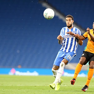 Brighton and Hove Albion vs Barnet: Intense Moment as Connor Goldson Faces Off Against Shaquile Coulthirst in the EFL Cup