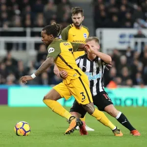 Brighton & Hove Albion's Gaetan Bong Faces Off Against Newcastle United in Premier League Clash (30DEC17)