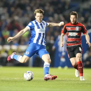 Brighton Midfielder Dale Stephens Fires a Shot Against Huddersfield Town (April 2015) Brighton Midfielder Dale Stephens Fires a Shot Against Huddersfield Town (April 2015)