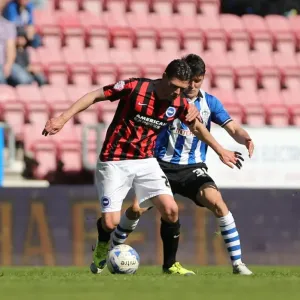 Brighton's Danny Holla in Action against Wigan Athletic during Sky Bet Championship Clash (18APR15) Brighton's Danny Holla in Action against Wigan Athletic during Sky Bet Championship Clash (18APR15)