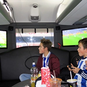 Brighton's Liam Rosenior Joins Fans for a Game of FIFA Aboard the Sky Bet 10 in 10 Bus to Birmingham City Match