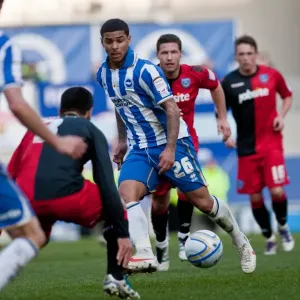 Championship Clash: Liam Bridcutt's Intense Duel Against Portsmouth at Amex Stadium (March 10, 2012) Championship Clash: Liam Bridcutt's Intense Duel Against Portsmouth at Amex Stadium (March 10, 2012)