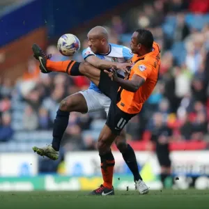 Chris O'Grady vs. Alex Baptiste: Intense Moment from the Championship Clash between Blackburn Rovers and Brighton & Hove Albion (21MAR15)