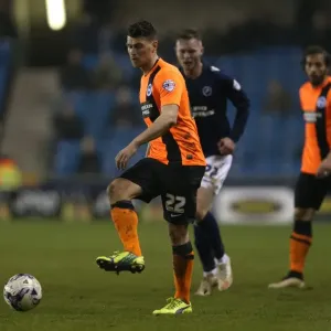 Danny Holla in Action: Brighton Midfielder Faces Off Against Millwall (17MAR15)
