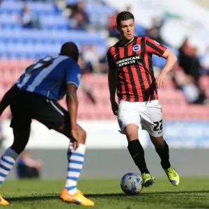 Danny Holla in Action: Brighton Midfielder Fights for Possession against Wigan Athletic (18APR15) Danny Holla in Action: Brighton Midfielder Fights for Possession against Wigan Athletic (18APR15)