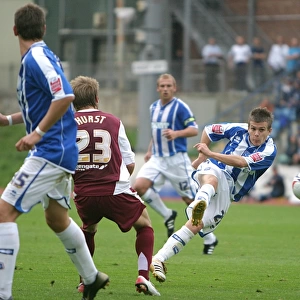 Dean Cox of Brighton & Hove Albion FC in Action: A Shooting Moment