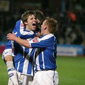 Dean Hammond celebrates his second goal with KErry Mayo & Dean Cox