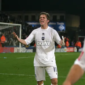 Dean Hammond celebrates victory at the end of the game