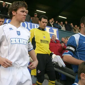 Dean Hammond leads Albion out at Boundary Park