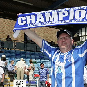 A fan celebrates our League 1 success in 2011