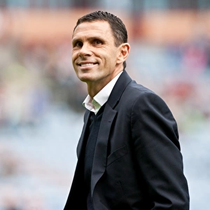 Gus Poyet Grins Amidst the Action: Burnley vs. Brighton & Hove Albion, Npower Championship (September 1, 2012)