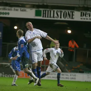 Guy Butters beats Oldhams Paul Warne in the air