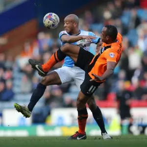 Intense Face-Off: Chris O'Grady vs. Alex Baptiste in the Championship Clash between Blackburn Rovers and Brighton & Hove Albion (21MAR15)