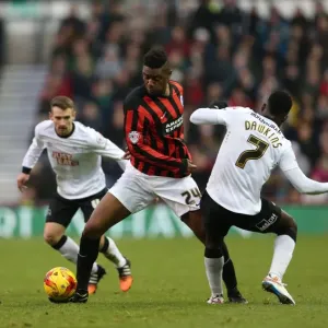 Intense Rivalry: Rohan Ince Faces Off Against Opponent in Derby vs. Brighton Championship Clash (Dec 2014)