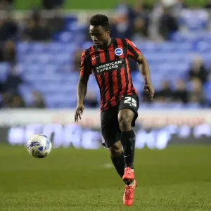 Kazenga LuaLua in Action: Brighton's Midfielder Shines in Championship Clash vs. Reading (10MAR15)