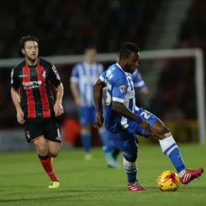 Kazenga LuaLua of Brighton and Hove Albion in Action at Bournemouth's Goldsands Stadium during SkyBet Championship Match, November 2014 Kazenga LuaLua of Brighton and Hove Albion in Action at Bournemouth's Goldsands Stadium during SkyBet Championship Match, November 2014