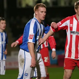 Kerry Mayo with Craig Armstrong of Cheltenham Town Kerry Mayo with Craig Armstrong of Cheltenham Town