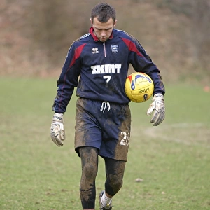 A muddy Wayne Henderson after training at Falmer