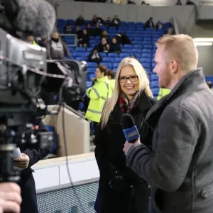A Romantic Moment at the Football Field: Jamie Howell Proposes to Kristina Sinclair during Brighton and Hove Albion vs. Millwall (12DEC14)