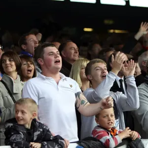 A Sea of Passion: Brighton & Hove Albion vs. Peterborough United (October 30, 2010) - The Electric Atmosphere of the Crowd