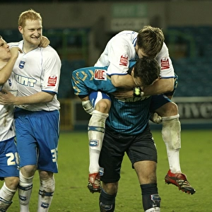 Team Celebrate winning at Millwall in the JPT