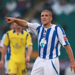 Unyielding Defender: Adam El-Abd's Focused Performance for Brighton & Hove Albion FC Unyielding Defender: Adam El-Abd's Focused Performance for Brighton & Hove Albion FC