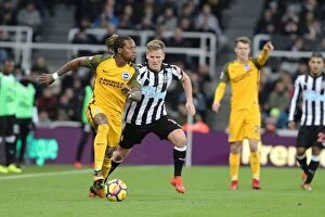 Images Dated 30th December 2017: Bong vs Ritchie: Intense Battle in Newcastle United vs Brighton and Hove Albion (30DEC17)