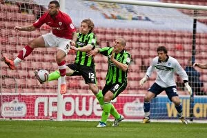 Images Dated 28th April 2012: Brighton & Hove Albion: Craig Davies, Craig Mackail-Smith, and Adam El-Abd at Barnsley's Oakwell