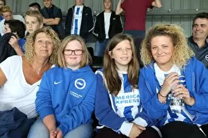 Images Dated 15th August 2015: Brighton & Hove Albion: Euphoric Fans Celebrate Championship Victory at Craven Cottage (15-08-2015)