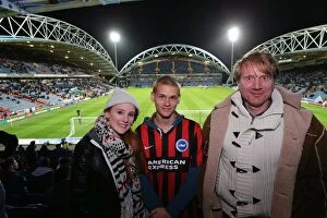 Images Dated 21st October 2014: Brighton and Hove Albion Fans in Action at Huddersfield Championship Match, 2014