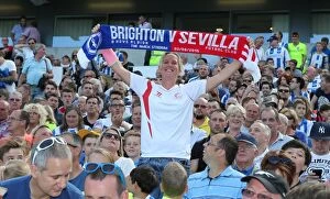 Images Dated 2nd August 2015: Brighton and Hove Albion Fans Celebrate at the American Express Community Stadium During