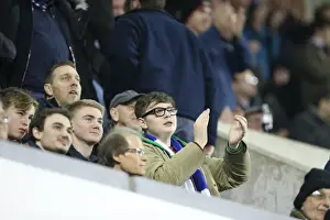 Millwall Prints: Brighton and Hove Albion Fans in Full Force at Millwall Championship Match