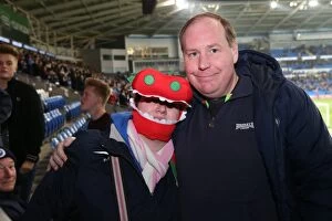 Images Dated 10th February 2015: Brighton and Hove Albion Fans Passionate Display at Cardiff City Stadium, 10th February 2015