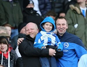 Images Dated 21st March 2015: Brighton and Hove Albion Fans in Full Swing at Blackburn Rovers Championship Match, March 2015