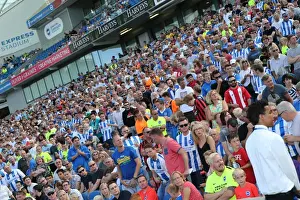 Albion Fans During The Sevilla Match Prints: Brighton and Hove Albion Fans in Full Swing: Pre-season Cheer at Sevilla FC Match, 2015