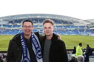 Huddersfield Town 14APR15 Prints: Brighton and Hove Albion Fans in Full Swing: A Sea of Colors against Huddersfield Town (14APR15)