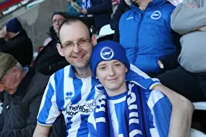 Wigan Athletic 18APR15 Prints: Brighton and Hove Albion Fans in Full Swing at Wigan Athletic Championship Match