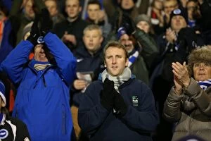 Images Dated 29th December 2014: Brighton and Hove Albion Fans in Full Throat at Craven Cottage (2014)