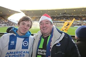 Images Dated 20th December 2014: Brighton and Hove Albion Fans' Unwavering Passion at Wolverhampton Wanderers Championship Match