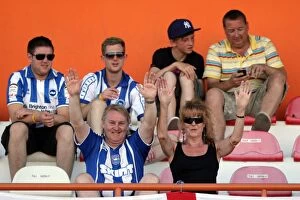 Portugal Pre-season 2011-12 Collection: Brighton and Hove Albion FC: Electric Atmosphere of Away Crowds - Portugal Pre-season 2011-12