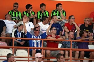 Portugal Pre-season 2011-12 Collection: Brighton and Hove Albion FC: Electric Atmosphere of Away Days Crowds - Portugal Pre-season 2011-12