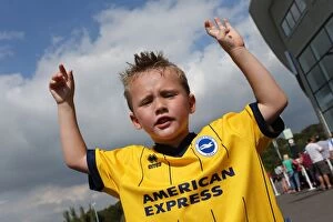 Images Dated 3rd September 2013: Brighton & Hove Albion FC: Unforgettable Fan Interactions at the September 2013 Club Shop Signing