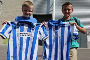 Images Dated 3rd September 2013: Brighton & Hove Albion FC: Unforgettable Fan Interaction at the September 2013 Club Shop Signing