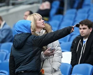 Images Dated 14th March 2015: Brighton and Hove Albion FC: Unwavering Fan Support in Sky Bet Championship Clash vs