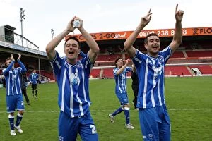 Celebration Collection: Brighton & Hove Albion: League 1 Title Win - Euphoric Celebration at Walsall, April 2011