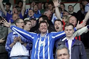 Images Dated 16th April 2011: Brighton & Hove Albion: League 1 Title Win - Euphoric Fans Celebrate at Walsall, April 2011