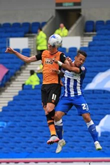 Images Dated 12th September 2015: Brighton & Hove Albion: Liam Rosenior and Sam Clucas Battle for the Ball in Sky Bet Championship