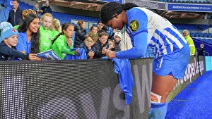 Brighton & Hove Albion vs. Tottenham Hotspur: A Premier League Showdown - Women's Super League Clash at Amex Stadium (15OCT23): Intense Action on the Football Pitch