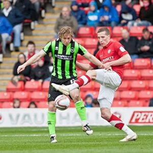 Images Dated 28th April 2012: Brighton & Hove Albion vs Barnsley: Intense Battle for Possession between Craig Mackail-Smith