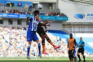 Images Dated 12th September 2015: Brighton & Hove Albion vs. Hull City: A Battle for the Ball - Greer vs. Akpom (Sky Bet Championship)